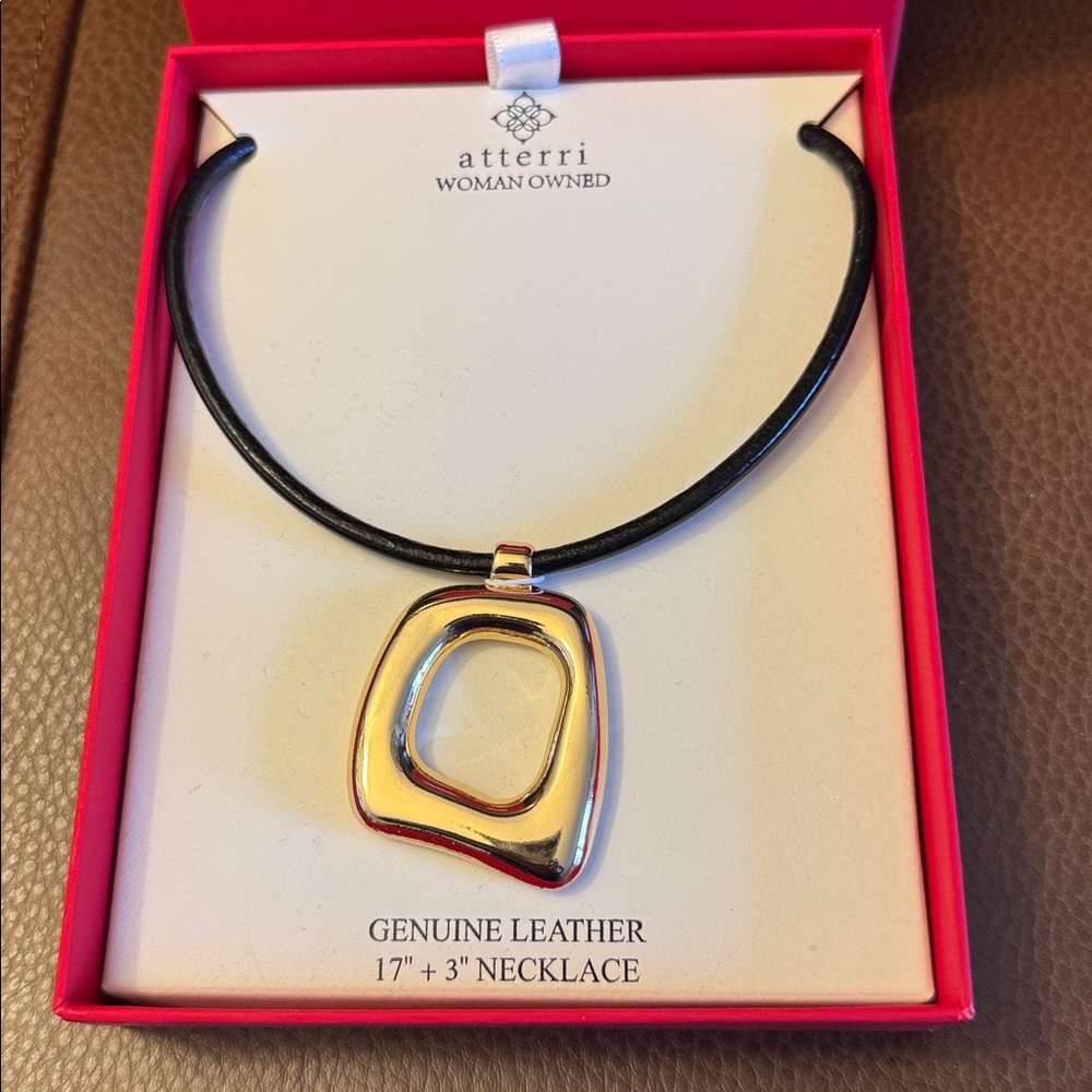 NIB Atterri genuine leather necklace with gold tone abstract pendant